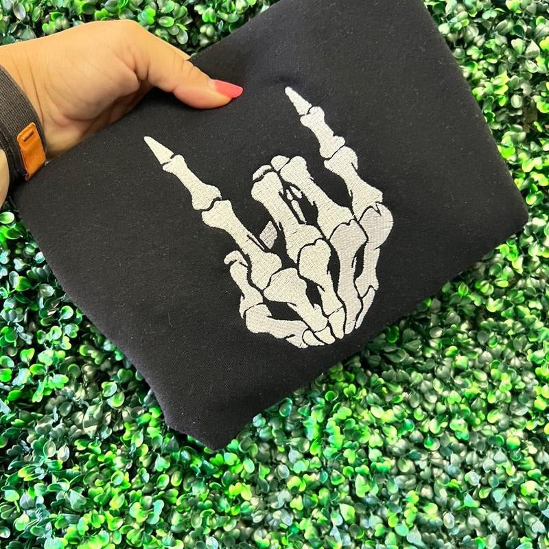 Rock on embroidered sweater