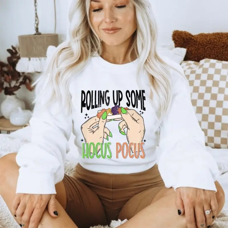 Rolling up Halloween shirt