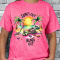 Sun's Out Buns Out T-shirt - Pink Casual T-Shirt with Graphic Design Featuring Sun, Skeleton, and Palm Trees